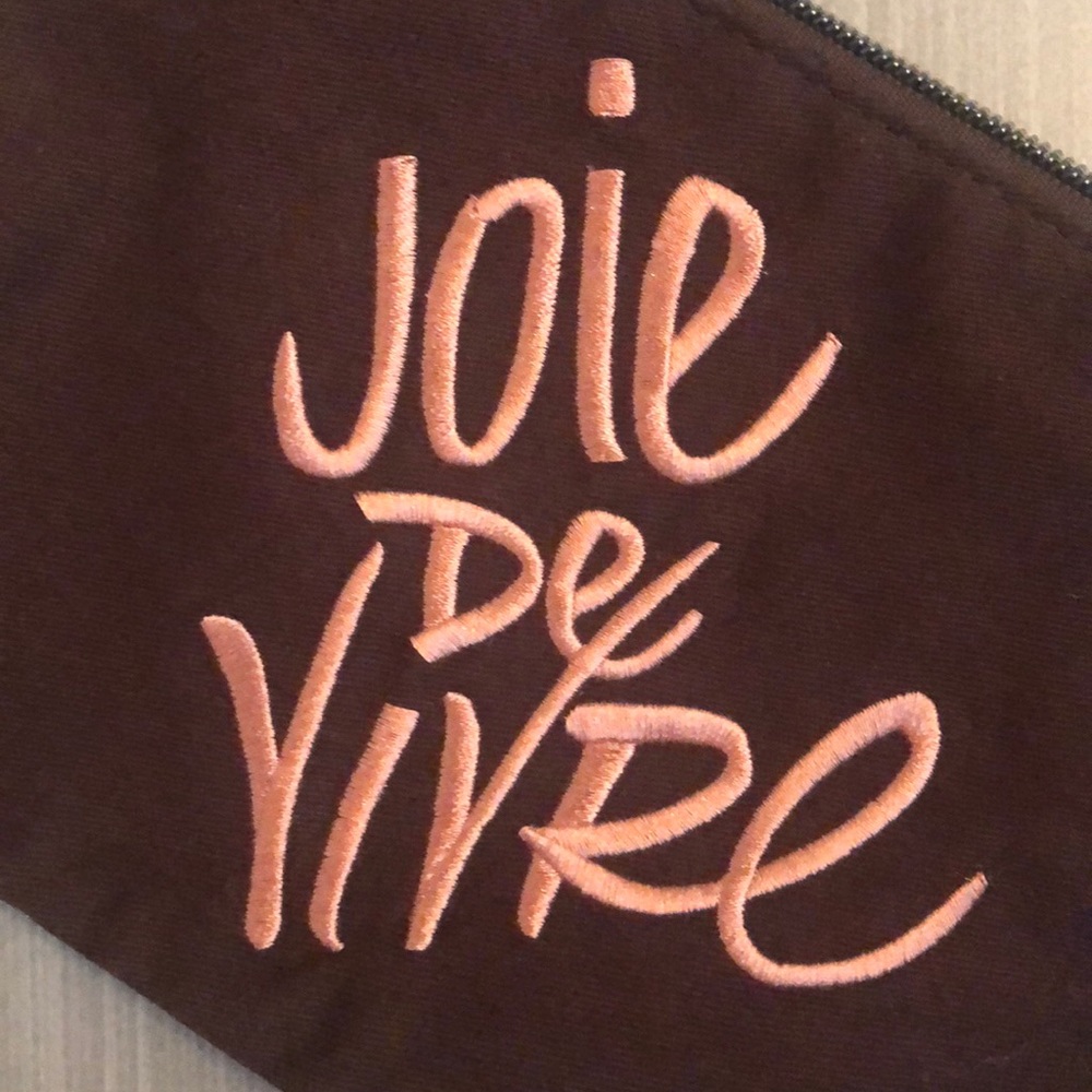 NWOT Laura Mercier “Jolie de Vivre” mini bag